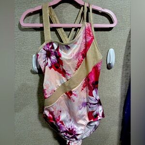 Girls pink and gold floral gymnastics leotard with matching shorts